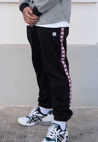 HANDMADE JOGGERS IN BLACK WITH LOGO LINES