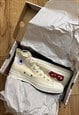 Comme des garcons play white high converse trainers