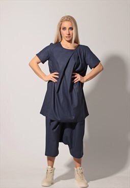 Oversized linen blouse with pressed box pleat