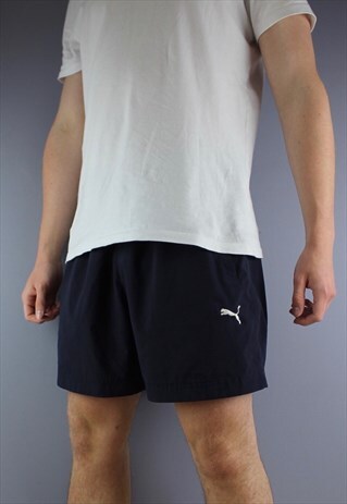 VINTAGE PUMA SHORTS IN NAVY WITH POCKETS AND EMBROIDERED LOG