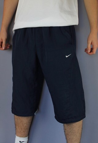 VINTAGE NIKE 3/4 LENGTH SHORTS IN NAVY WITH POCKETS, EMBROID