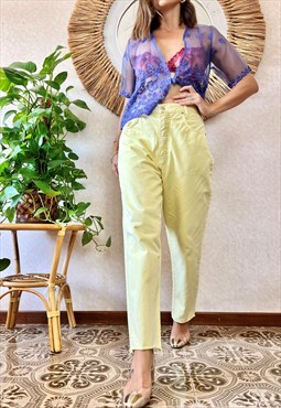 1990's vintage pastel yellow high waisted jeans