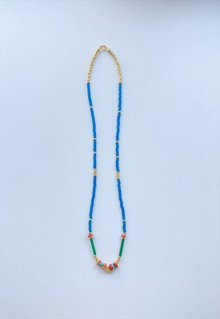 BEADED NECKLACE WITH GOLD PLATED BIRD CHARM