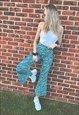 FLAURA ROSE EXCLUSIVE TURQUOISE ZEBRA PRINT FLARE TROUSERS