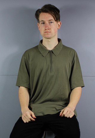 VINTAGE CALVIN KLEIN 1/4 ZIP POLO SHIRT IN GREEN WITH LOGO.