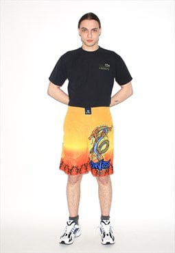 Vintage 90s dragon print shorts in orange