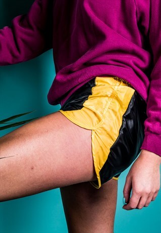 VINTAGE 1980S SPORTS SHORTS IN BLACK AND YELLOW