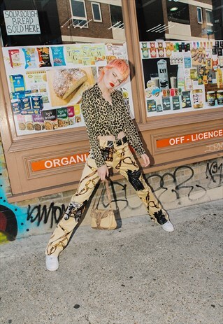 RARE VINTAGE 90'S DOLCE & GABBANA HORSE PRINT FLARED JEANS
