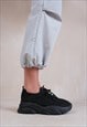 WHISPER CHUNKY SOLE KNIT TRAINERS IN BLACK