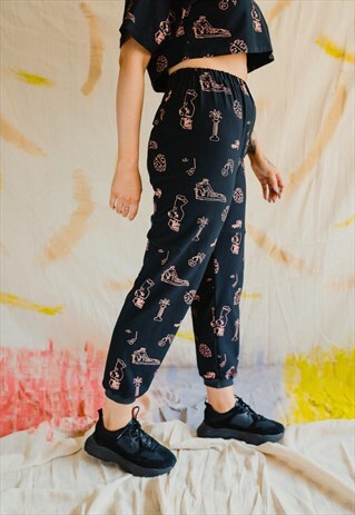 BLACK PEDESTAL REPEAT PRINT JOGGERS
