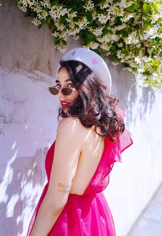 WHITE BERET WITH LACE UP DETAIL AND HEART EMBROIDERY