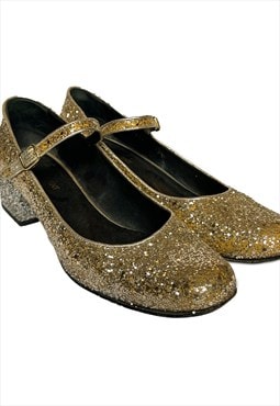 Gold Saint Laurent babies shoes. 38.5