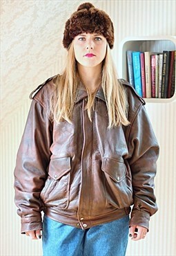 brown winter pom pom hat
