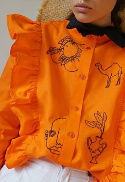 Hand embroidered orange cowboy shirt with ruffles