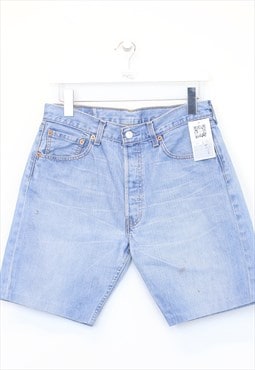 Vintage Levi's denim cut off shorts in blue. Best fits W29"