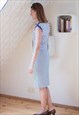 WHITE SLEEVELESS DRESS WITH BLUE DOTS