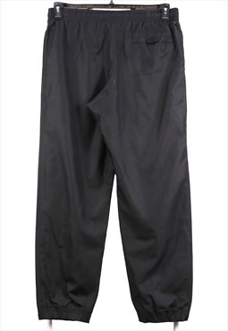 Vintage 00's Y2K Nike Trousers / Pants Swoosh Baggy Bootcut