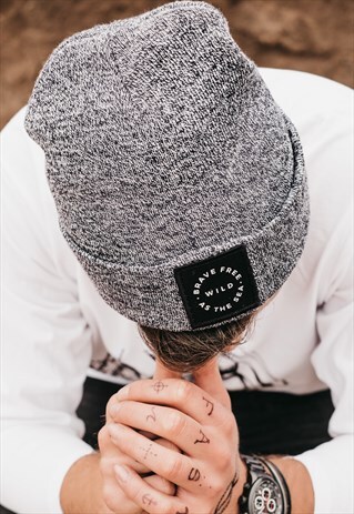 'BRAVE FREE WILD AS THE SEA' BEANIE IN NAVY MARL