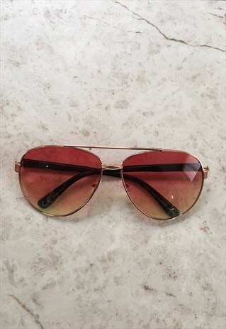 AVIATOR SUNGLASSES IN RED AND YELLOW TINT.