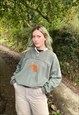 VINTAGE 90S BANFF CANADA SWEATSHIRT SIZE MEDIUM IN GREEN
