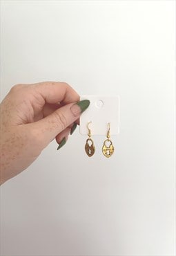Gold antique charm lock earrings