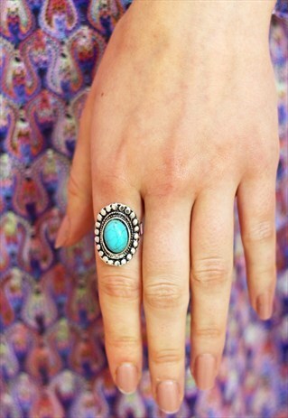 TIBETAN SILVER AND TURQUOISE OVAL SHAPED ADJUSTABLE RING