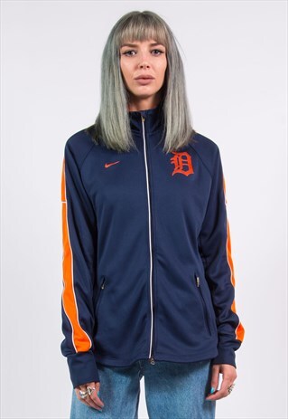 grey nike tracksuit with orange stripe