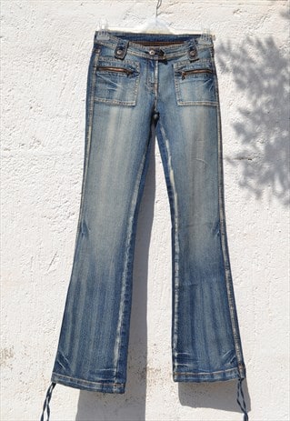 Deadstock y2k mid rise stretch bootcut jeans.