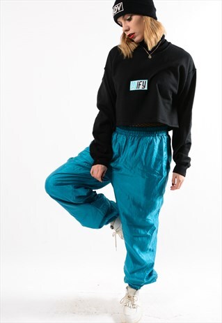 TURQUOISE VINTAGE SHELL PANTS.