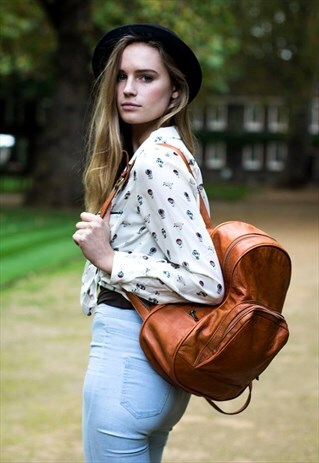 BROWN LEATHER BACKPACK WITH ZIP ROUND OPENING