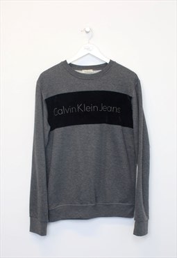 Vintage Calvin Klein sweatshirt in grey. Best fits M