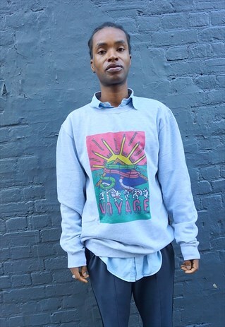 VOYAGE OVERSIZED RAVE FLYER SWEATER IN GREY.
