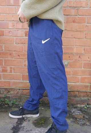 blue nike tracksuit bottoms