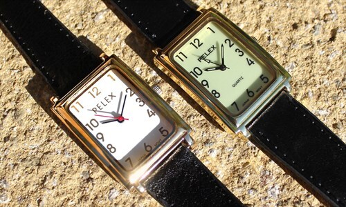 Gold and luminous square watches