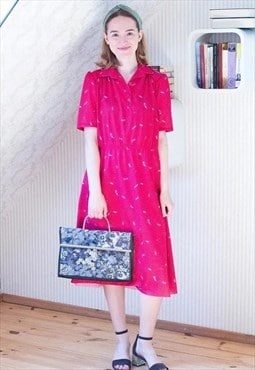 Bright pink short sleeve vintage dress with blue patterns