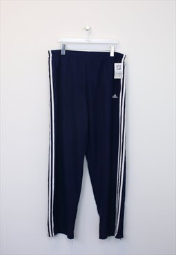 Vintage Adidas track pants in blue. Best fits XL