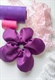 PURPLE SATIN OVERSIZE FLOWER SCRUNCHIE 