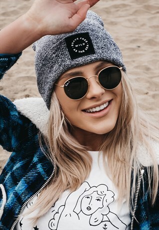 'BRAVE FREE WILD AS THE SEA' BEANIE HAT IN NAVY MARL