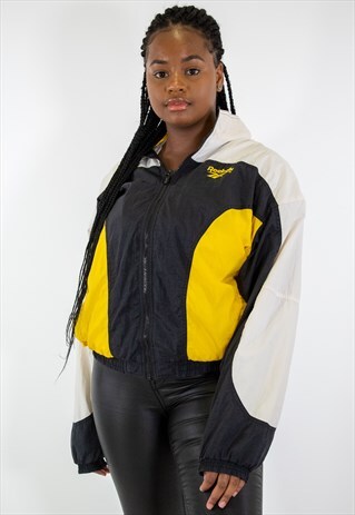VINTAGE REEBOK SHELL WINDBREAKER JACKET IN BLACK M/L