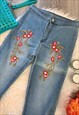 RIPPED KNEE EMBROIDERED BLUE SKINNY JEANS