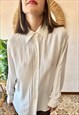 1990's vintage oversize cream blouse with black stitching
