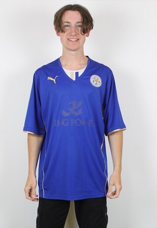 VINTAGE PUMA FOOTBALL SHIRT IN BLUE WITH EMBROIDERED LOGO.