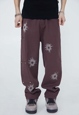 Straight jeans gunshot wound patch pants in brown