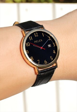 GOLD NUMBERED WATCH WITH DATE