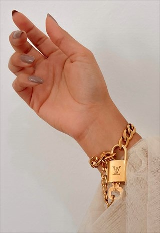 AUTHENTIC LOUIS VUITTON PADLOCK AND KEY WITH BRACELET