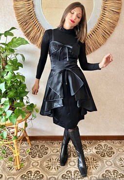 1950's black satin cocktail dress with ruffle skirt