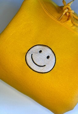 Smiling Face Embroidered Gold Hoodie