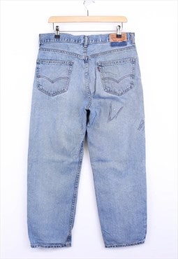 Vintage Levi's 550 Jeans Light Washed Blue Wide Leg 90s