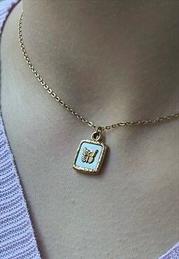Monarch butterfly necklace with shell pendant
