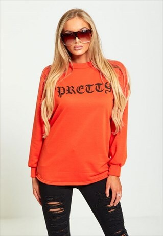 PRETTY SLOGAN JUMPER IN ORANGE